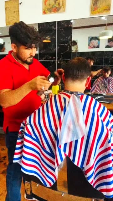 Barber at work in the shop