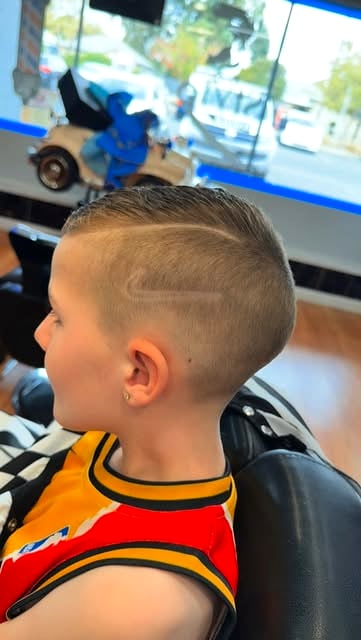 Kids haircut with a neat skin fade