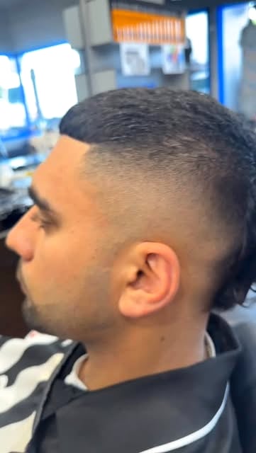 Clean low fade and neckline detail